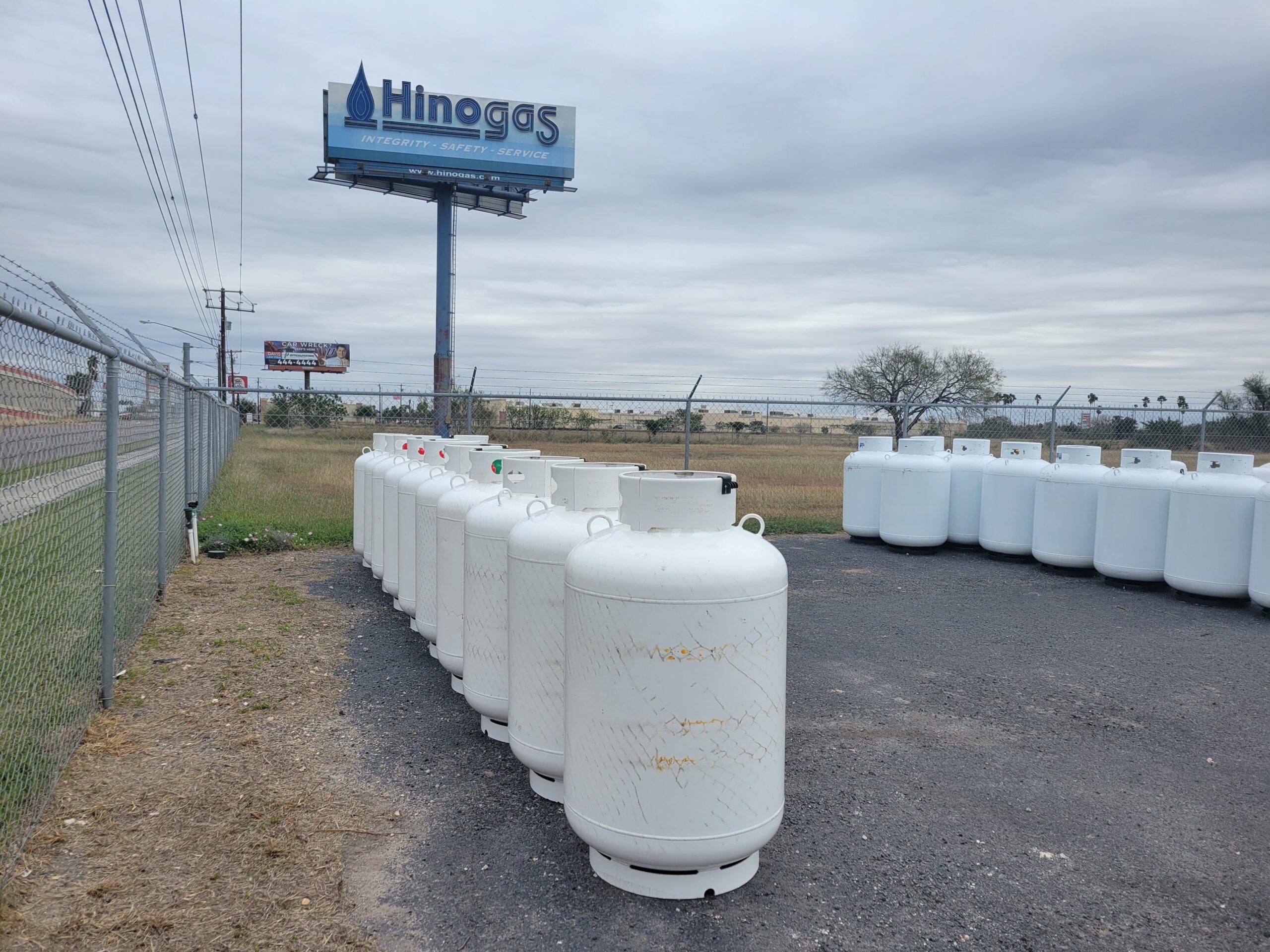 Propane tanks of several sizes lined up outside the Hino Gas yard in the Rio Grande Valley